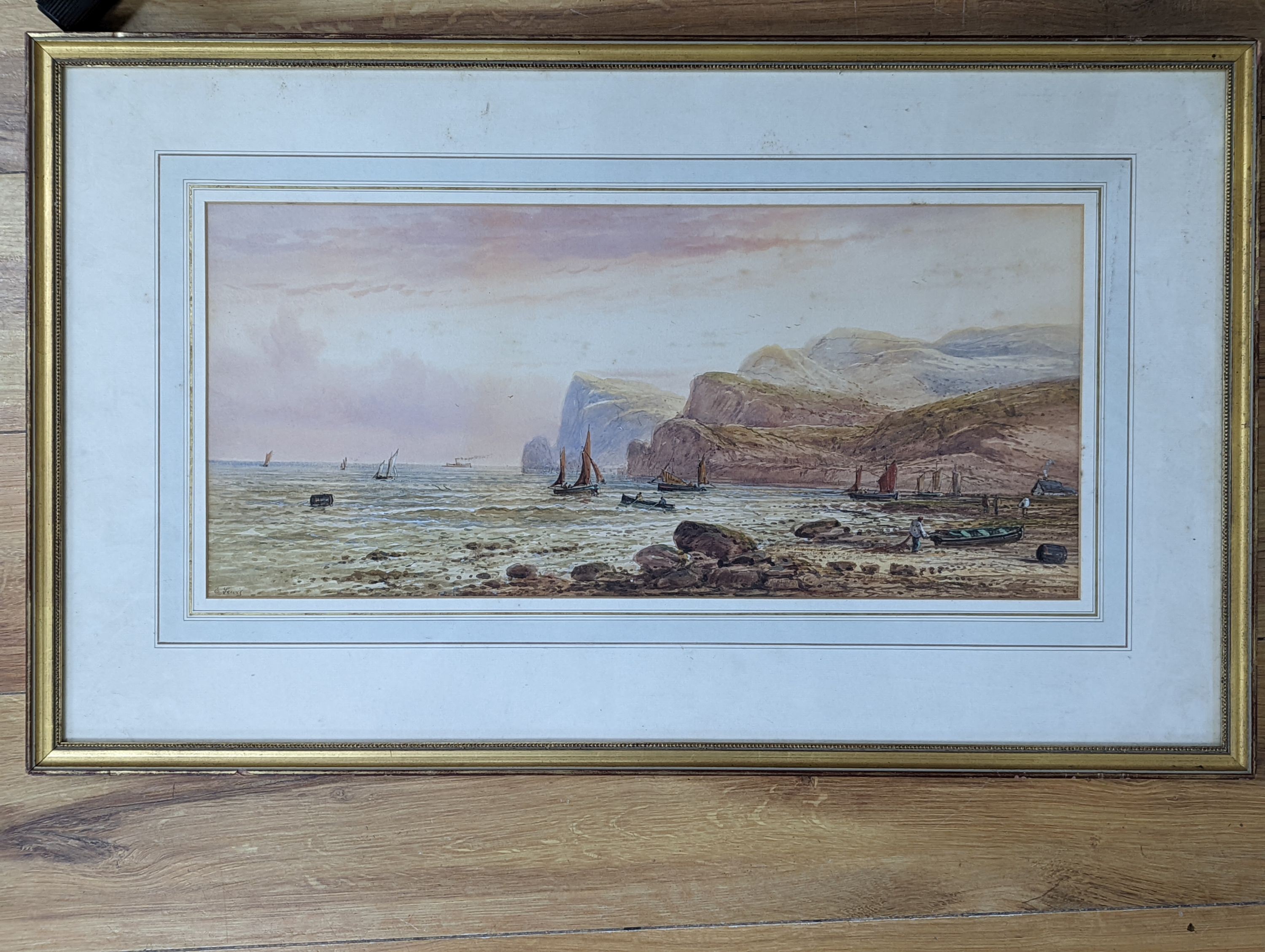 E. Lewis (Earp), watercolour, Fishing boats along the coast, signed, 23 x 53cm